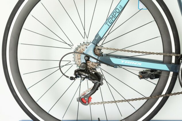 Велосипед Trinx Tempo 1.0 700C серый/голубой/белый 500м Фото №2